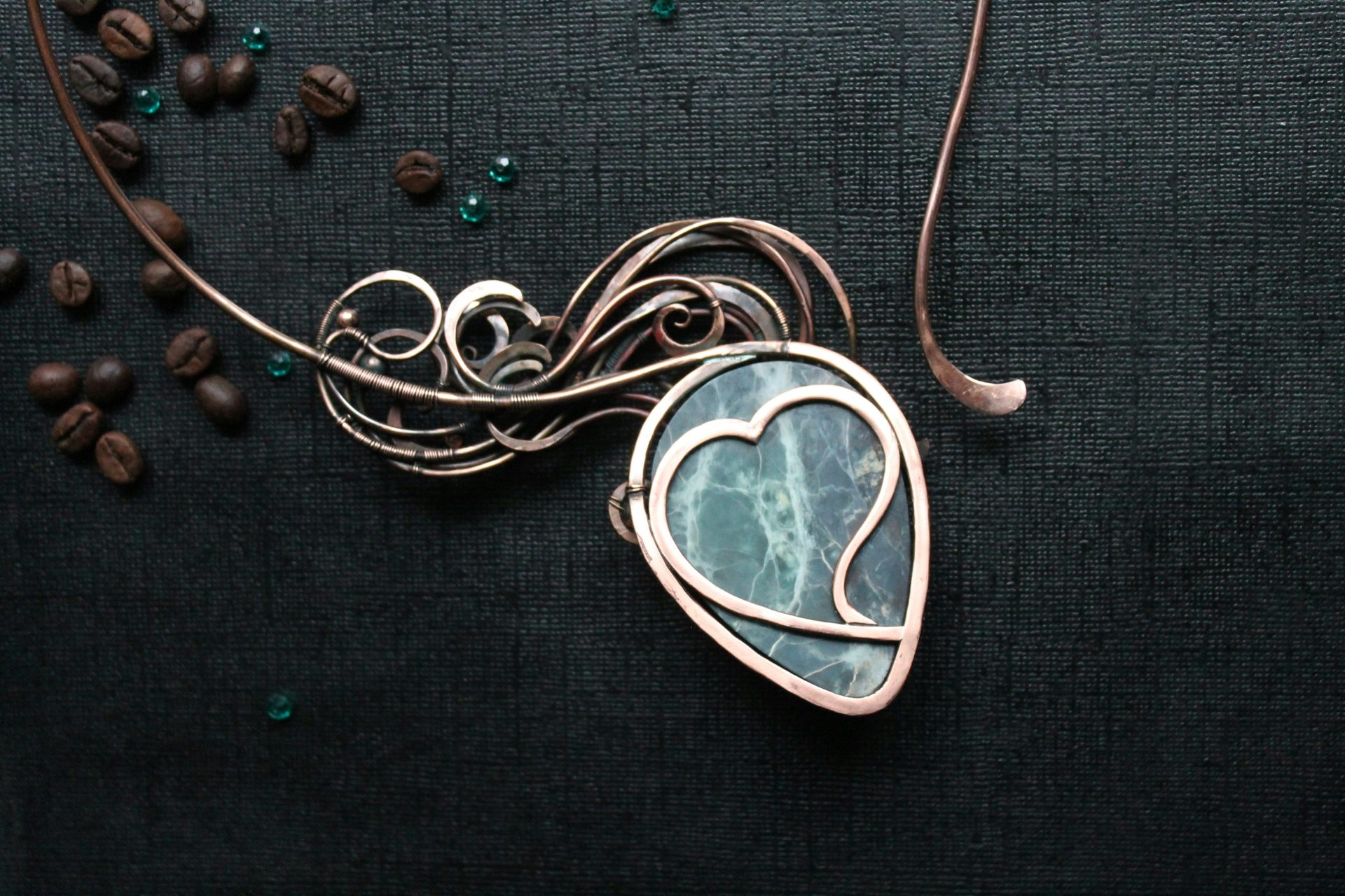 A close up of a necklace on a table
